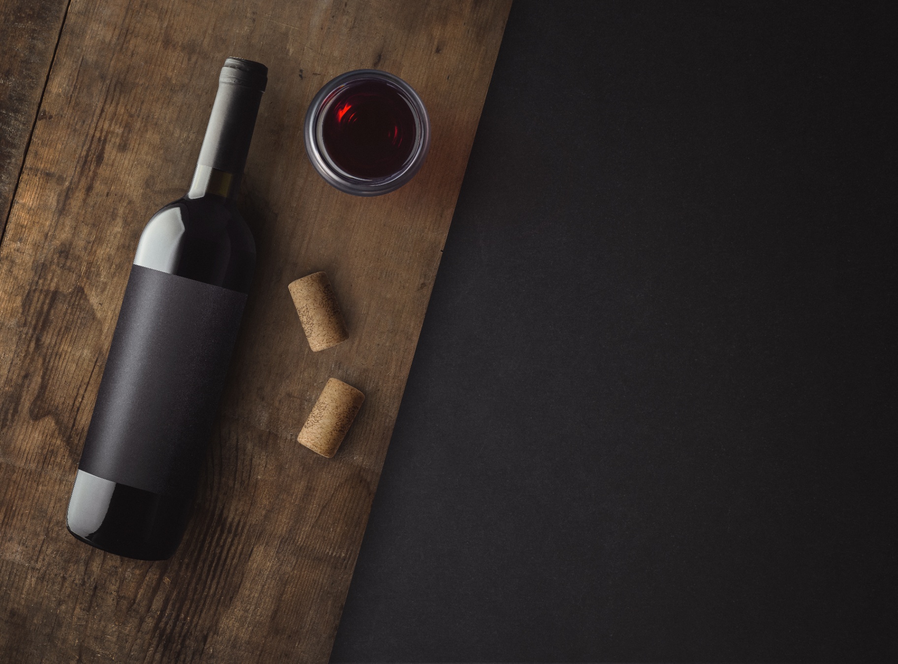 Wine bottle and glasses on a clean workspace